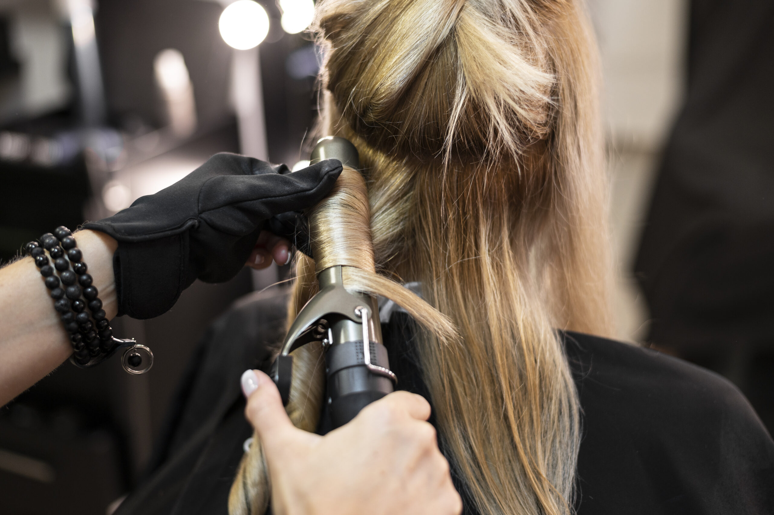 woman-getting-her-hair-done-beauty-salon